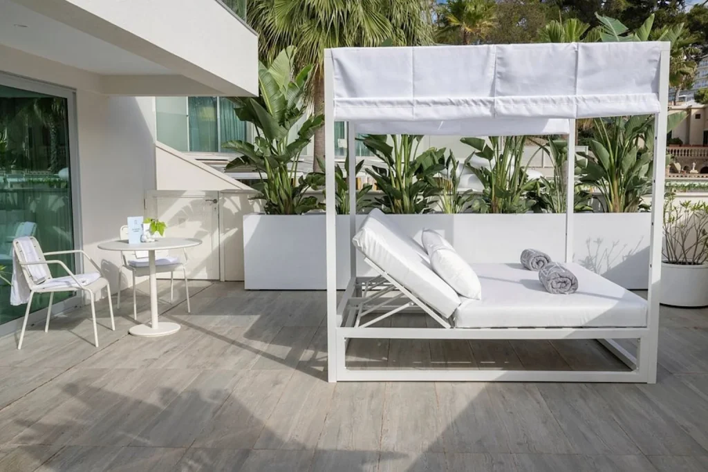Private terrace with daybed at The Donna Portals in Portals Nous, Mallorca
