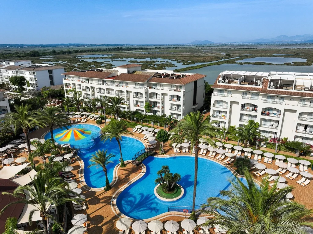 Lagoon-style pools and hotel complex at Viva Blue & Spa in Playa de Muro, Mallorca.